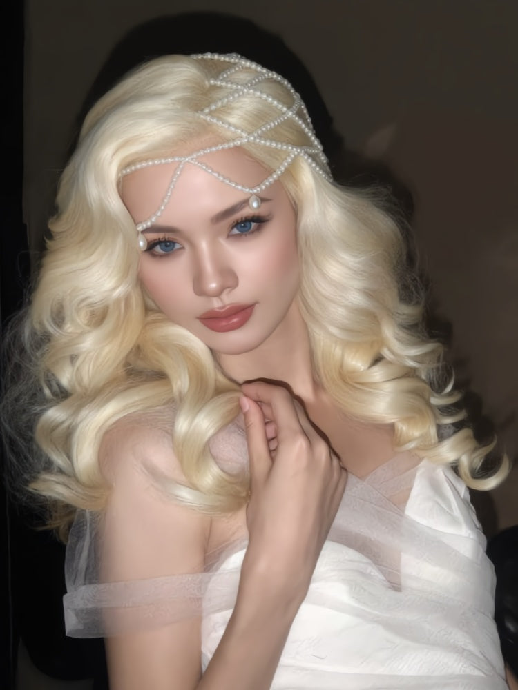 Ethnic-inspired vintage bridal teardrop pearl hair accessories, hand-strung runway-style jewelry, and unique, fashionable mesh hair accessories